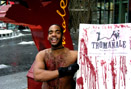 a tromanale guy in front of the berlinale bear
